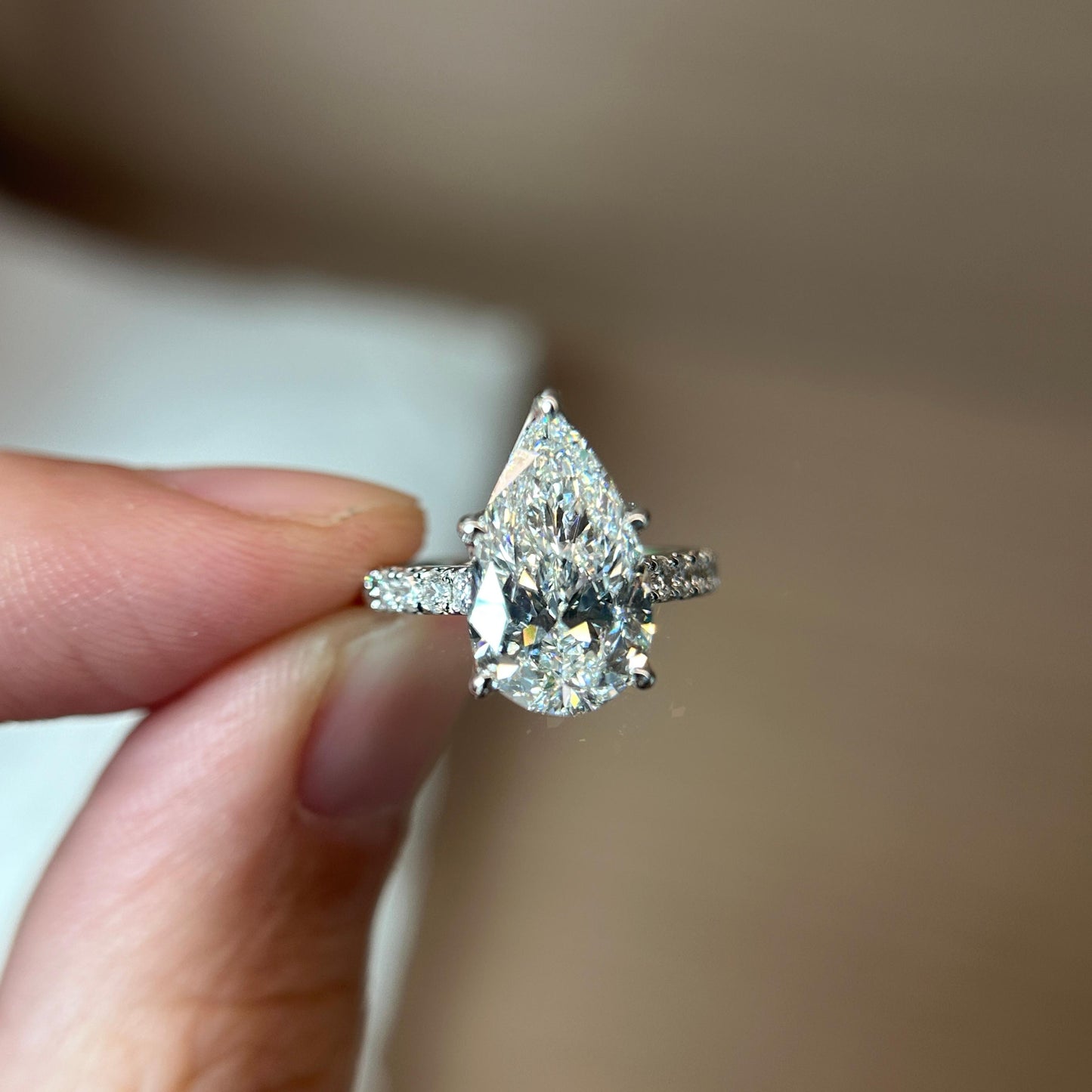 18K white gold Pear diamond ring and band for Sufiani